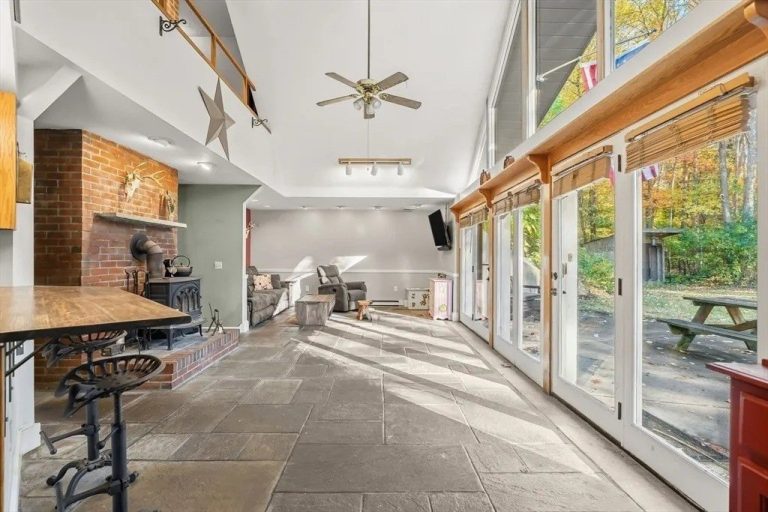 Earth-Sheltered Hobbit Home That Appears To Sink Into the Ground in Massachusetts Is Listed for Just $450K